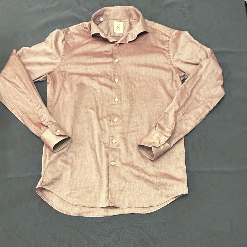 Strong Suit pink long sleeve button-up shirt.